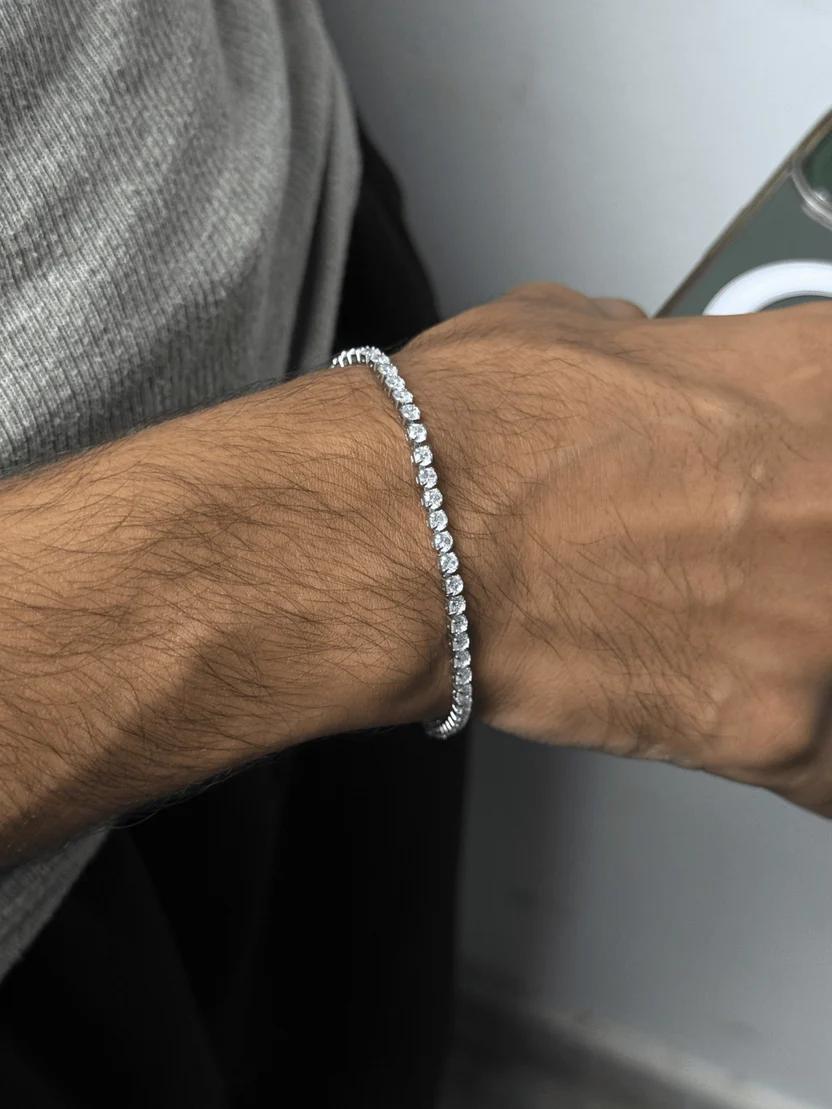 Silver stainless steel tennis bracelet worn on wrist - Dazzle Pakistan