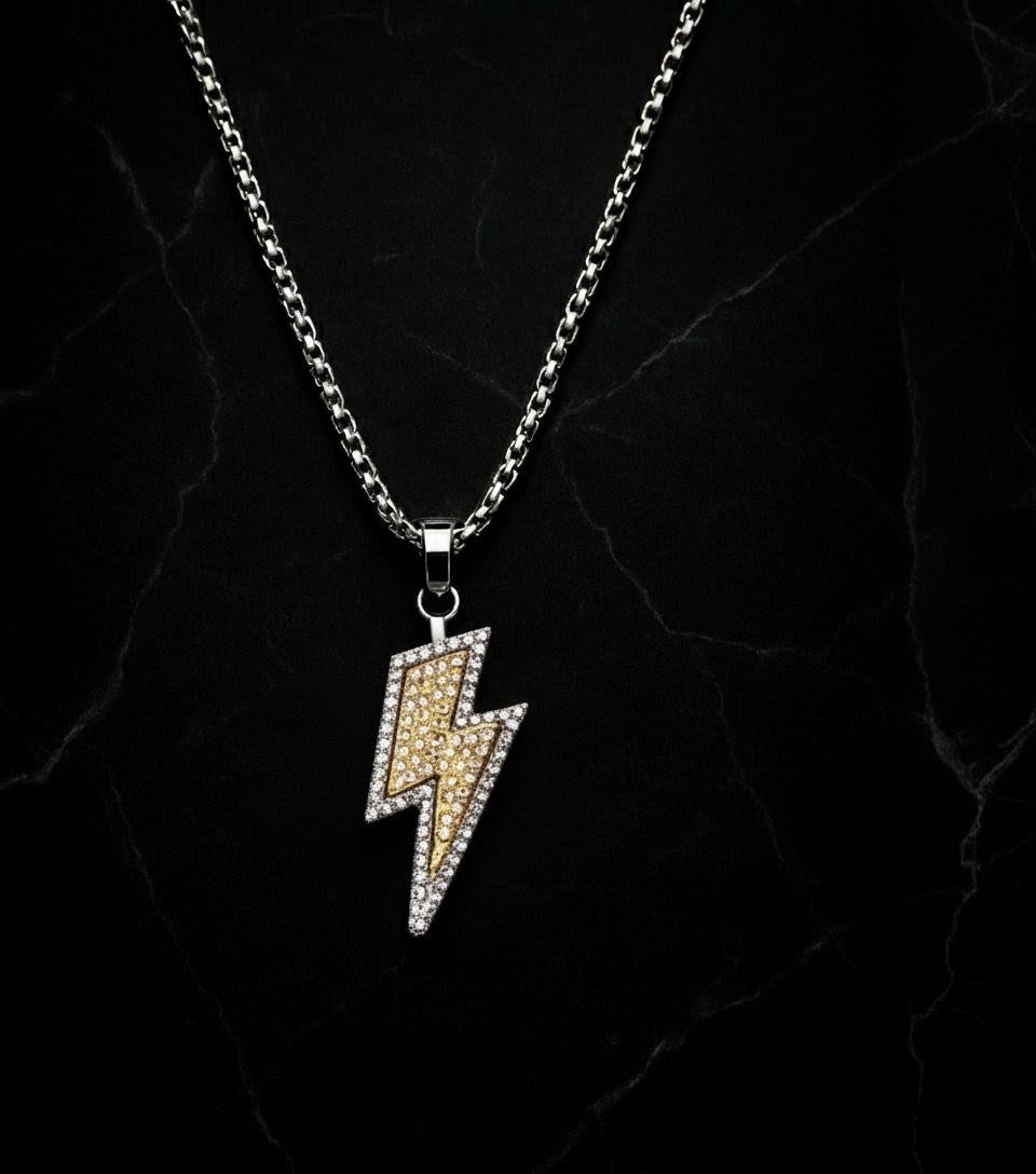 Necklace with a lightning bolt pendant on a dark marble background